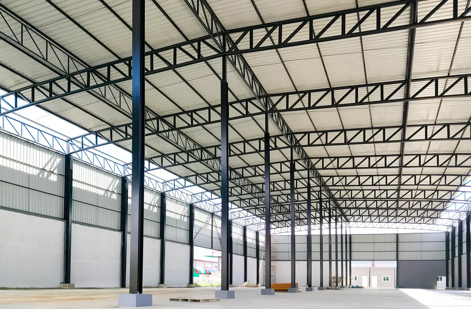 new-industrial-warehouse-building-structure-is-und-2023-11-27-05-15-55-utc-scaled