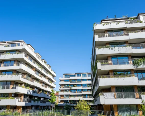 modern-apartment-buildings-with-a-concrete-facade-2023-11-27-04-55-45-utc-scaled